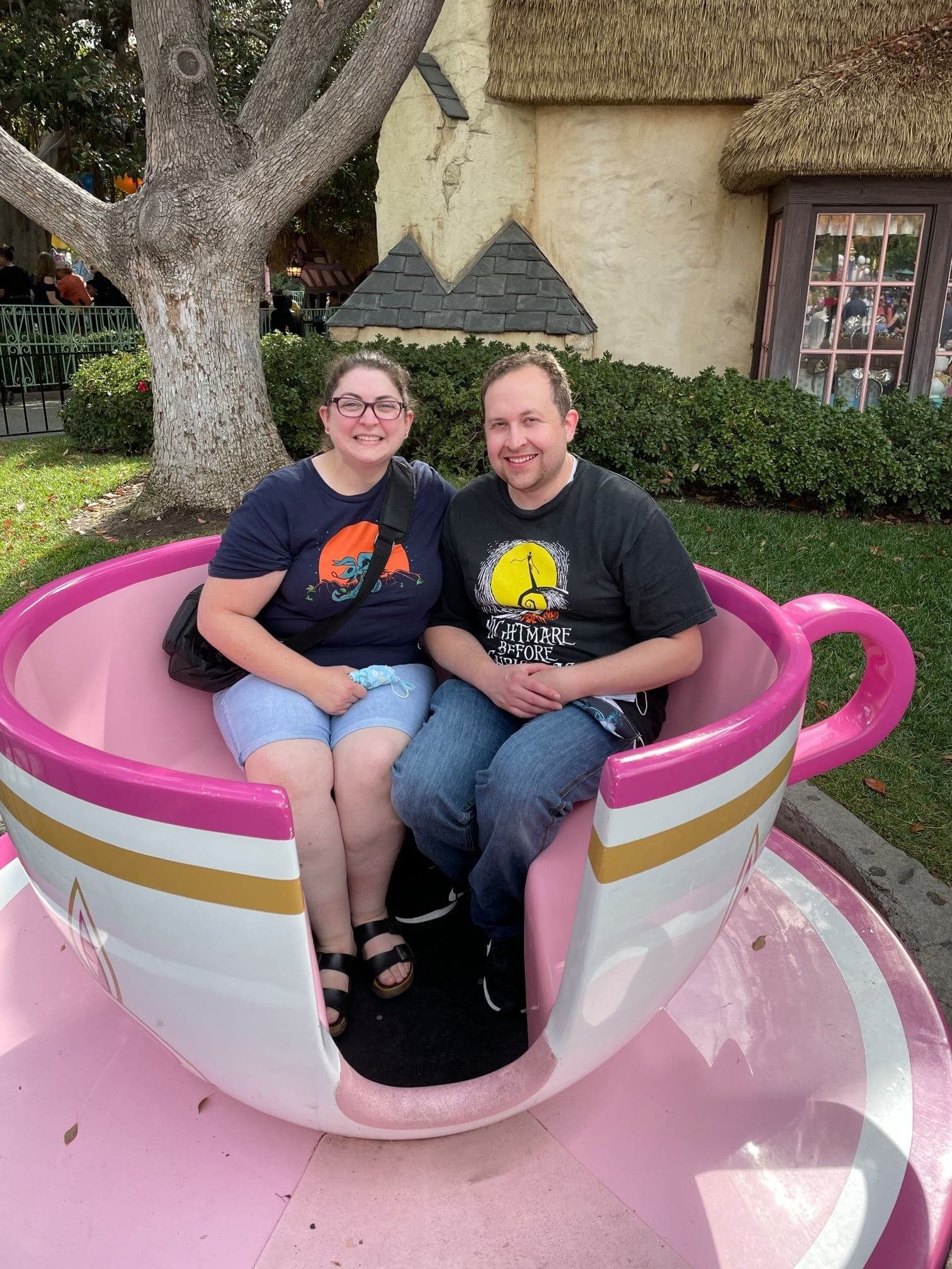 Chris and Ruth sitting in a colorful teacup